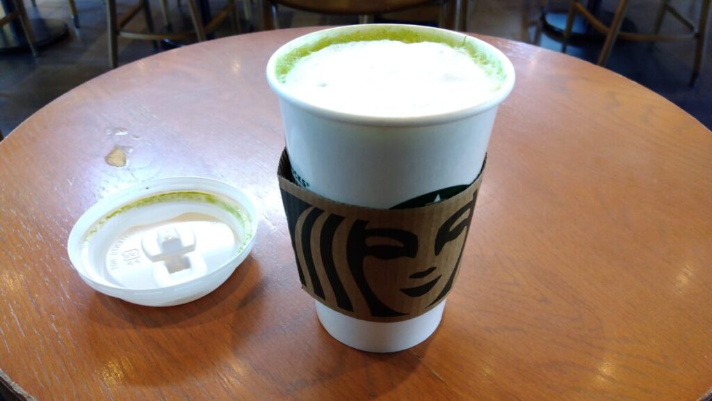 Matcha Tea Latte in a Japanese garden setting